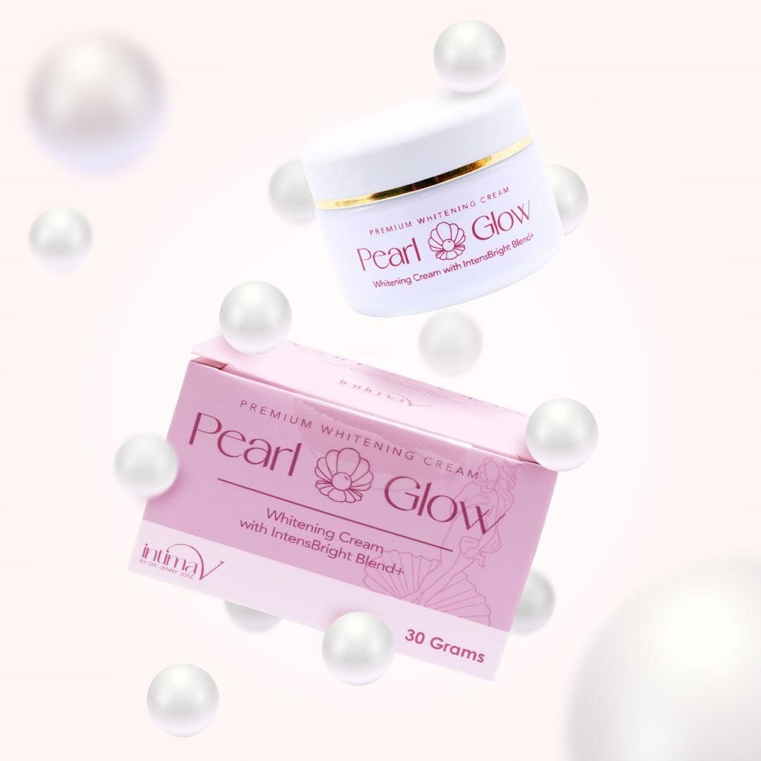 Pearl Glow whitening cream jar and pink box among pearls