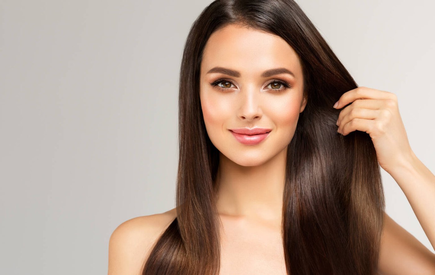 Woman with long glossy brown hair